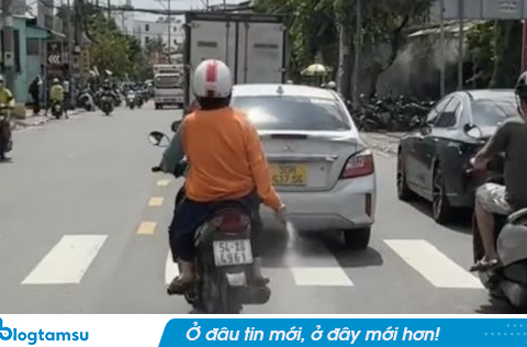 Cảnh sát đang xác minh video người phụ nữ rải “bột lạ” xuống đường ở TP HCM